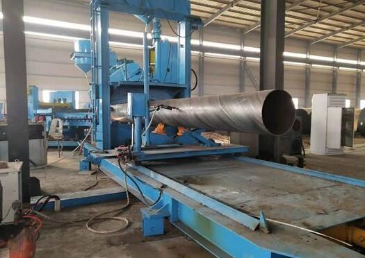 螺旋<a href=http://www.m.strongtop.com.cn target=_blank class=infotextkey>焊接鋼管</a>水淬火設(shè)備的設(shè)計及應(yīng)用